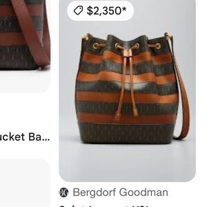 SAINT LAURENT
YSL Monogram Striped Drawstring Bucket Bag